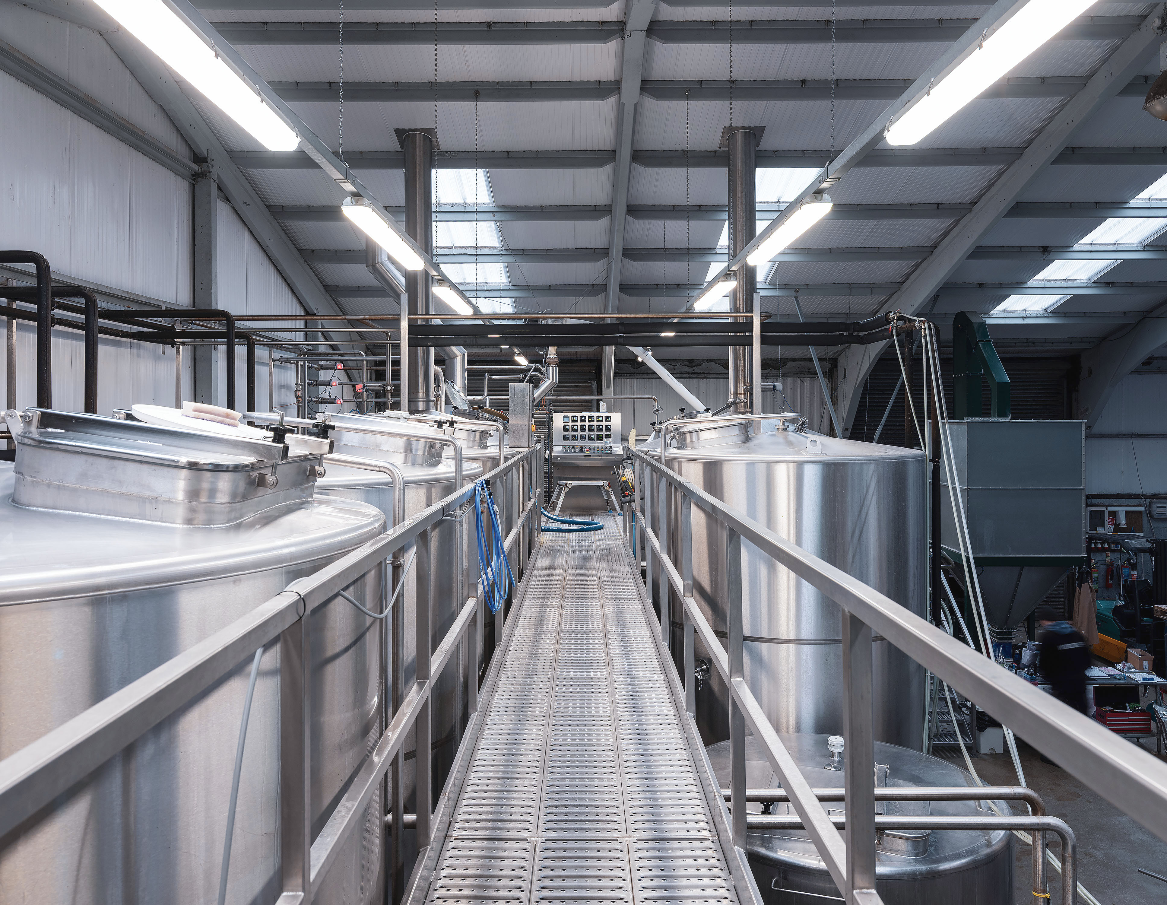 Brewing vessels and walkway inside Wold Top Brewery